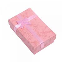Emballage avec noeud rose pour le plaisir d'offrir carton