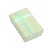 boîte vert carton avec noeud pour un anniversaire