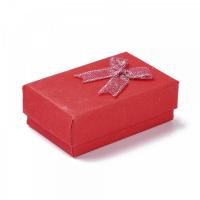 emballage carton rouge avec paillettes décoratives pour le plaisir d'offrir
